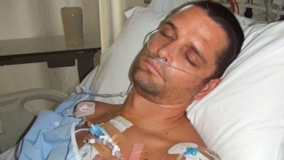 Ben Mckelvey in the hospital after his stroke in 2004.