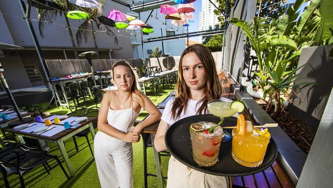 Hideaway Kitchen &amp; Bar Function co-ordinators Emma Rodger (left) and Tiffany Brewster are frustrated Sydneysiders are locked out of visiting their Gold Coast business. Picture: Nigel Hallett