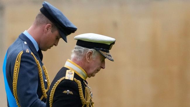 Prince William, left, and King Charles at the Committal Service for Queen Elizabeth II in St George's Chapel inside Windsor Castle on Tuesday (AEST). Picture: AFP