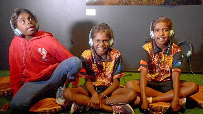 Rhonda Miller, Lesley Adams and Danielle Watson listen to their 'deadly' recordings at the Rockhampton art gallery. Picture: Jann Houley