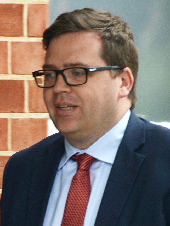 Education Minister John Gardner has apologised for the “disruption” caused by his controversial decision to restrict enrolments at Adelaide High School and Adelaide Botanic High School.