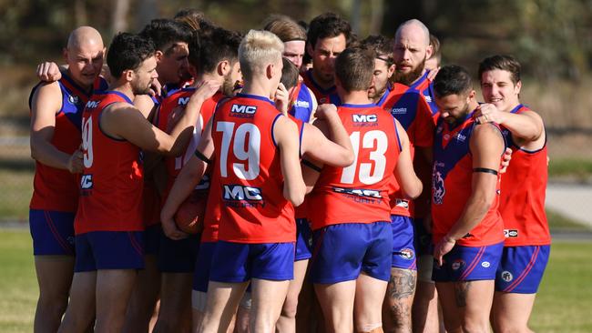 Mernda players come together before a Northern Football League game. Picture: Nathan McNeill