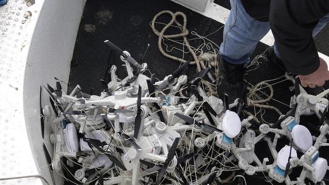 Hundreds of drones were fished out of the Yarra River on Sunday. Picture: Valeriu Campan