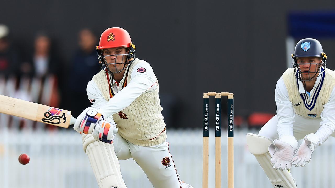 Alex Carey plays the reverse sweep as he topscored with 90 for South Australia against NSW in the Sheffield Shield. Picture: Mark Evans / Getty Images