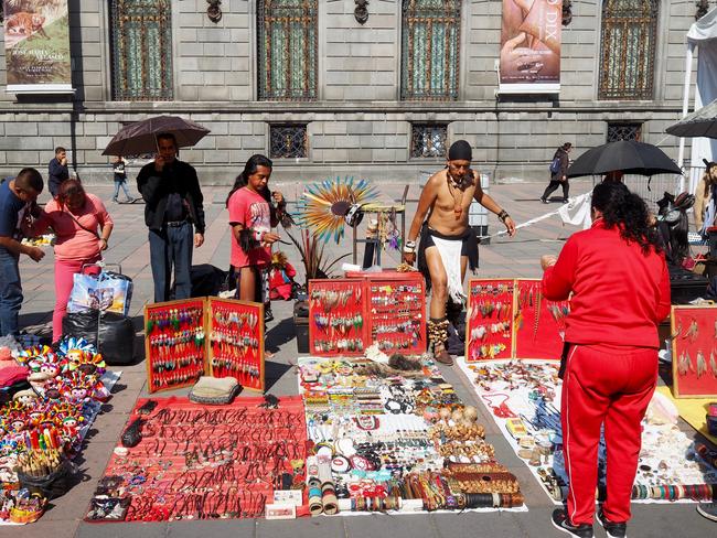 Open-air street markets are common in Mexico City, selling handcrafted jewellery, clothing and food. Picture: Leah McLennan