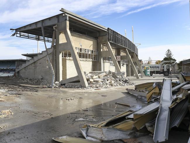 The grandstand at Football Park begins to be torn down, making room for a 1300-home development and aged-care home. Picture: Sarah Reed