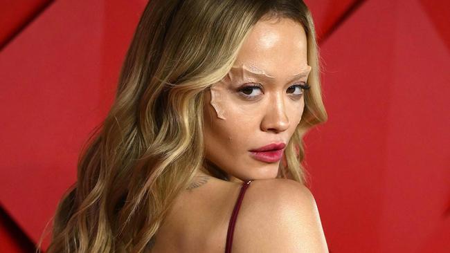 British singer songwriter Rita Ora poses on the red carpet upon arrival at The 2022 Fashion Awards in London. Picture: Daniel Leal/AFP