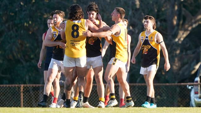 Frankston YCW players celebrate a goal. Picture: Valeriu Campan