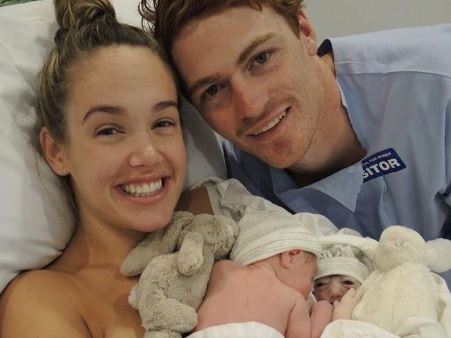 Gary Rohan and wife Amie with their twin daughters Bella and Willow. Picture: Instagram