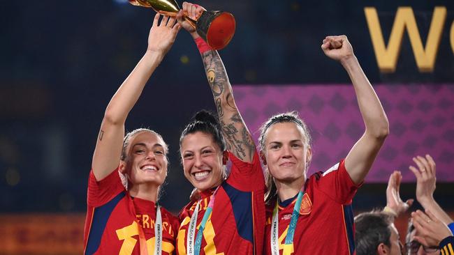 Jennifer Hermoso, Alexia Putellas and Irene Paredes celebrate after winning the World Cup final. Photo by FRANCK FIFE / JIJI PRESS / AFP.