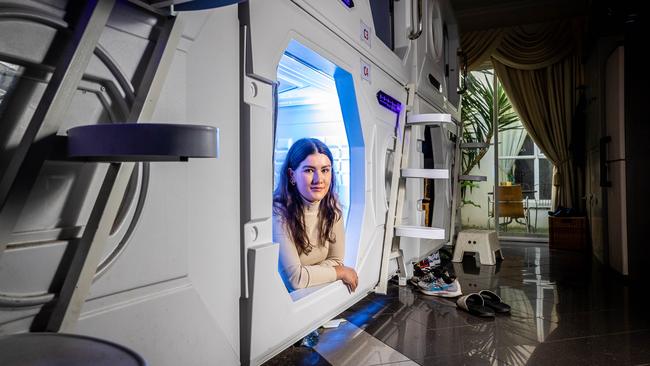 Emily won’t be rushing out of her rental for another night in the space pods any time soon. Picture: Jake Nowakowski