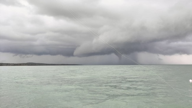 The weather storm pushed north from the Great Sandy Strait. Picture: Joshua Evans