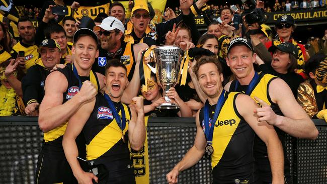 Tom Lynch, Jayden Short, Kane Lambert and Dylan Grimes celebrate last year’s Grand Final win. Picture: Mark Stewart