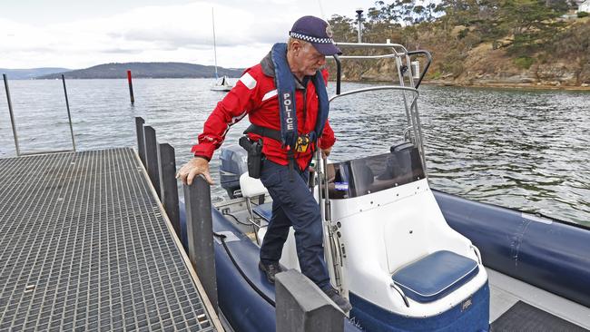 Ride along with the Tasmanian Police Marine and Rescue Services during Rock Lobster season patrols. Sergeant Damian Bidgood at Tinderbox boat ramp prepares the boat before conducting patrols. Picture: Zak Simmonds