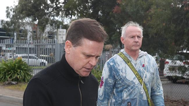 Jockey Danny Nikolic (left) leaves the Broadmeadows Magistrate court along with Pat Lennon (right). Picture: David Crosling