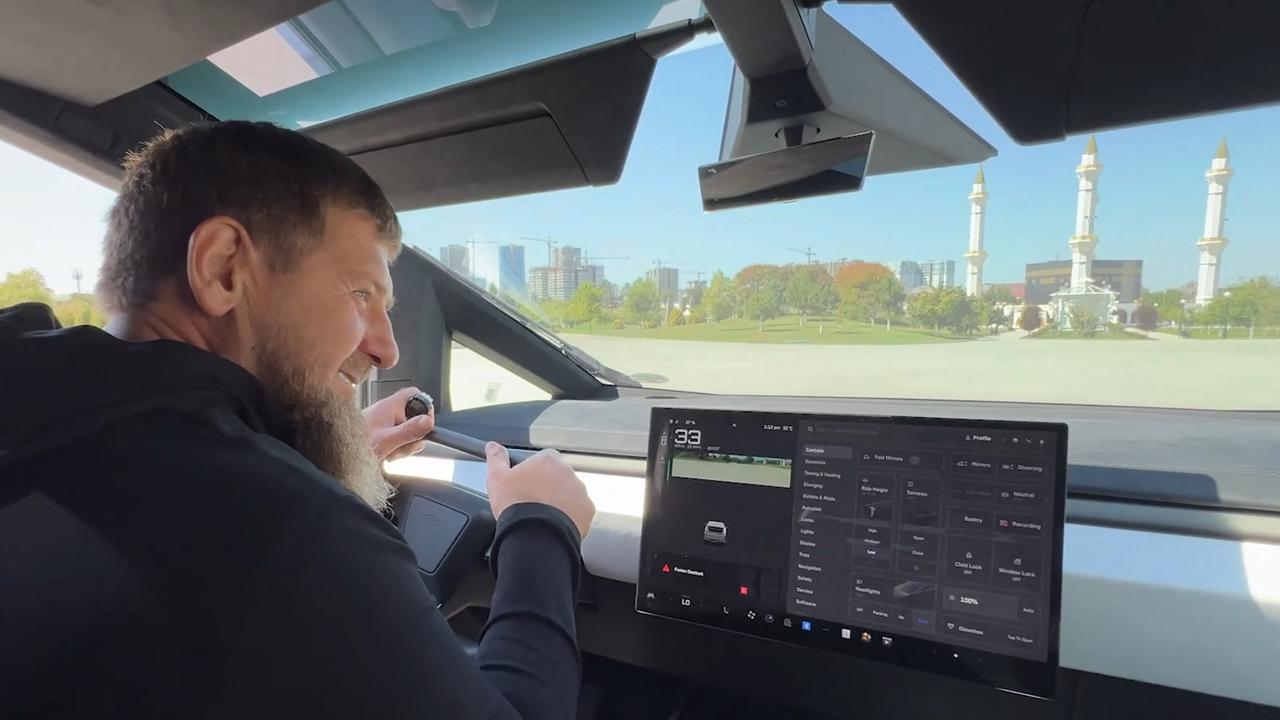 Kadyrov driving the gun-mounted Tesla Cybertruck. Picture: Handout/Telegram/@rkadyrov_95/AFP