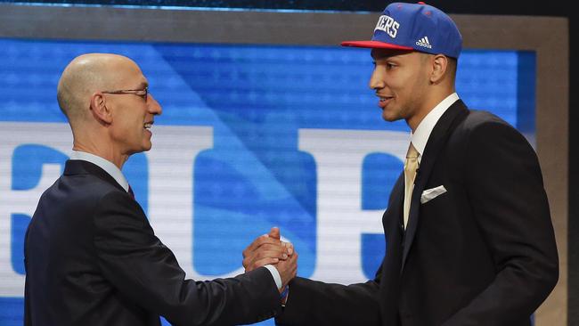 NBA Commissioner Adam Silver, left, greets Ben Simmons.