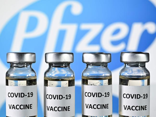 (FILES) In this file photo taken on November 17, 2020 An illustration picture shows vials with Covid-19 Vaccine stickers attached, with the logo of US pharmaceutical company Pfizer, on November 17, 2020. - Britain on December 2, 2020 became the first country to approve Pfizer-BioNTech's Covid-19 vaccine for general use and said it would be introduced next week. (Photo by JUSTIN TALLIS / AFP)