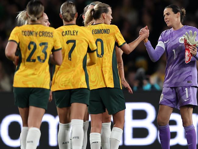 SYDNEY, AUSTRALIA - JUNE 03: Lydia Williams, goalkeeper of Australia is hugged by Emily Van-Egmond of Australia during the international friendly match between Australia Matildas and China PR at Accor Stadium on June 03, 2024 in Sydney, Australia. (Photo by Matt King/Getty Images)