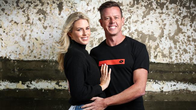 Supercars star James Courtney and his new partner Alexandra Elms together on the Gold Coast. Picture: Nigel Hallett