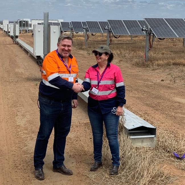 Local mayor Anne Baker congratulates Adani CEO Lucas Dow at the opening of the Rugby Run solar farm on Thursday.