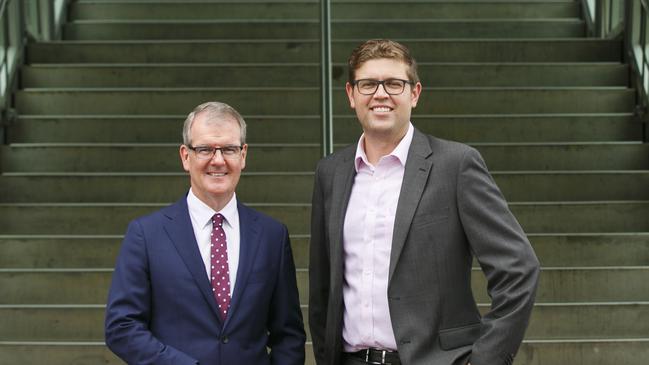 Tough stairway to victory: Labor leader Michael Daley and Ryde candidate Jerome Laxale.