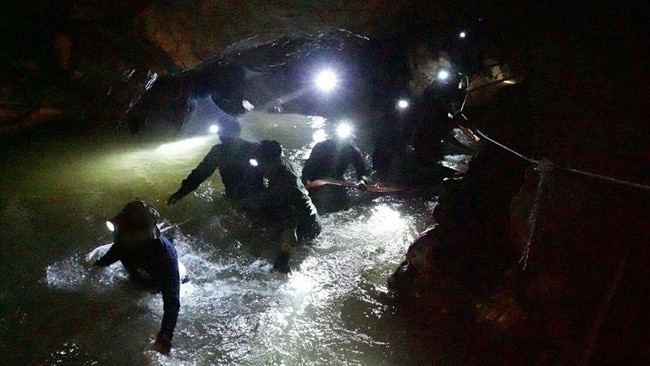 Thai Navy SEALS enter the Tham Luang caves during the enormous mission to rescue the 12 boys and their coach. Picture: Thai Navy SEAL / Getty Images