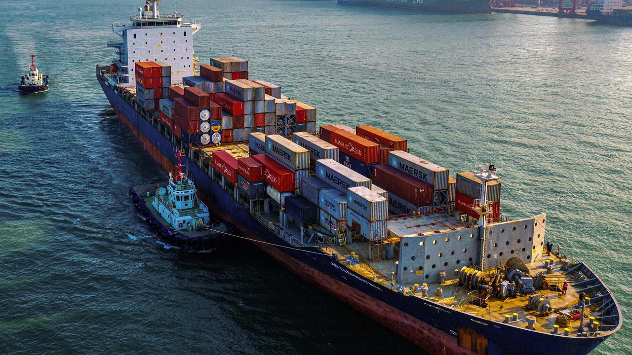 A cargo ship loaded with containers at a port in Qingdao in China's eastern Shandong province on January 14, 2020. Picture: STR / AFP