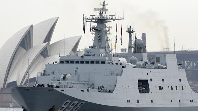 A visiting Chinese naval ship departs Garden Island Base in Sydney in 2019. It was a reciprocal visit after Australian naval vessels visited China.