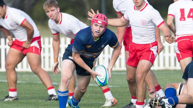 Nice passing from Churchie halfback Sam Farrar