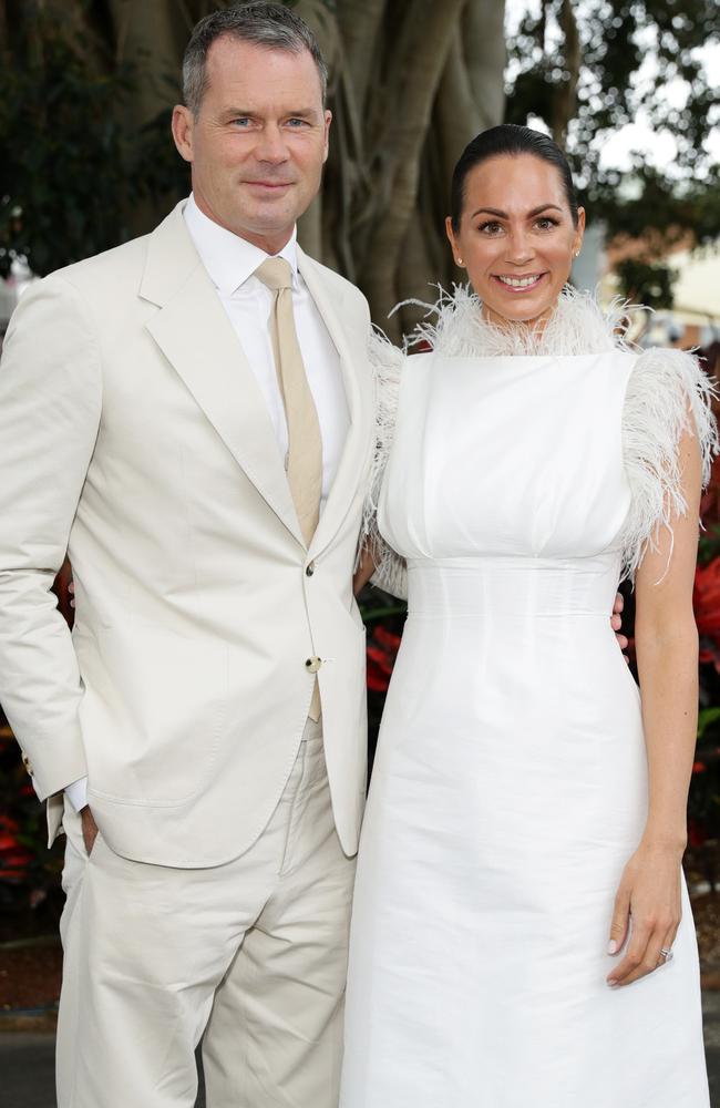 Tom Williams looked handsome in beige, while Rachel Gilbert was angelic in a crisp white gown. Picture: Matrix.