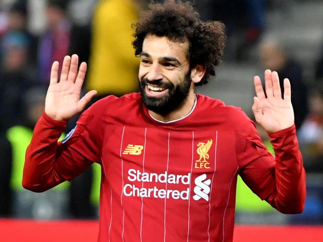 Liverpool's Egyptian midfielder Mohamed Salah reacts at the end of the UEFA Champions League Group E football match between RB Salzburg and Liverpool FC on December 10, 2019 in Salzburg, Austria. (Photo by BARBARA GINDL / APA / AFP) / Austria OUT