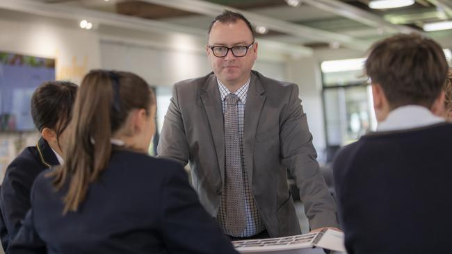 Westbourne Grammar principal Adrian Camm talks to students.