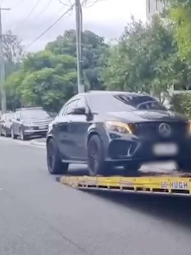 A car towed away during a raid. Photo Supplied QLD Police