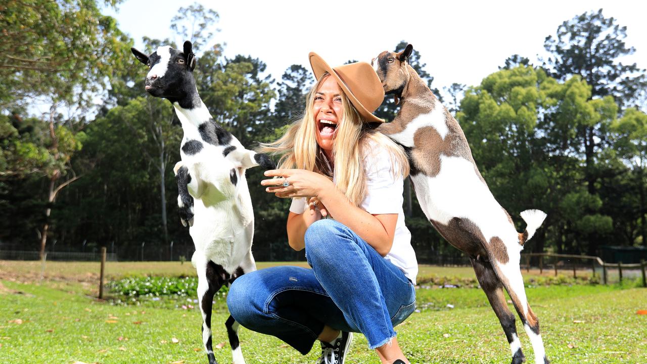 Tropical Fruit Worlds Shona Fuller gets up close and personal with the new baby Goats Photo Scott Powick