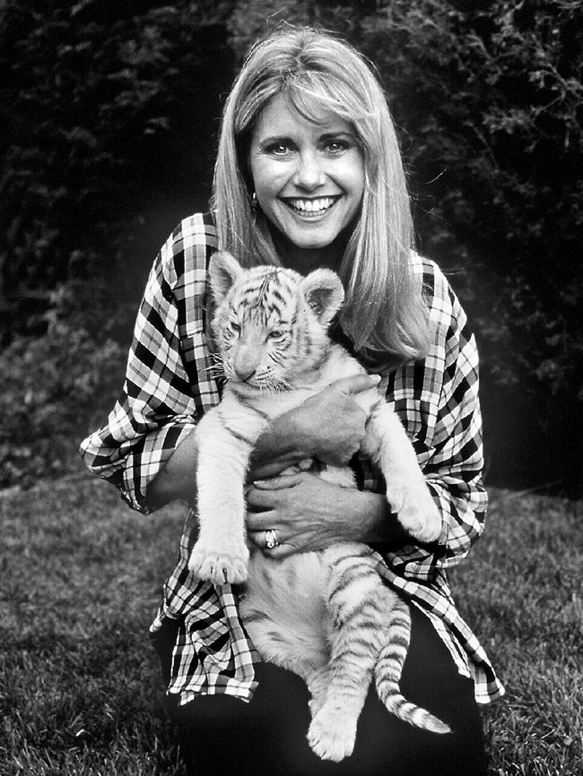 Holding a tiger cub. Picture: Supplied