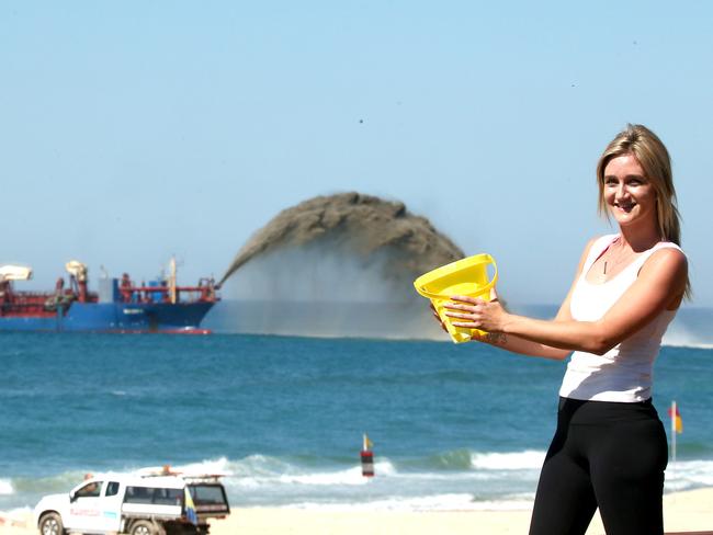 Pictured at Miami Beach helping with the Sand Pumping Chloe Woodroffe 24 of Palm Beach Picture Mike Batterham