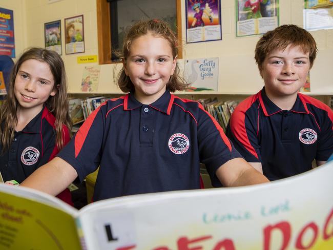South Hobart Primary School students Olive Waller, 9, Lily Warn, 9 and Isaac Butler, 10. South Hobart was the state's best overall primary school performer for Naplan results last year. Picture: RICHARD JUPE