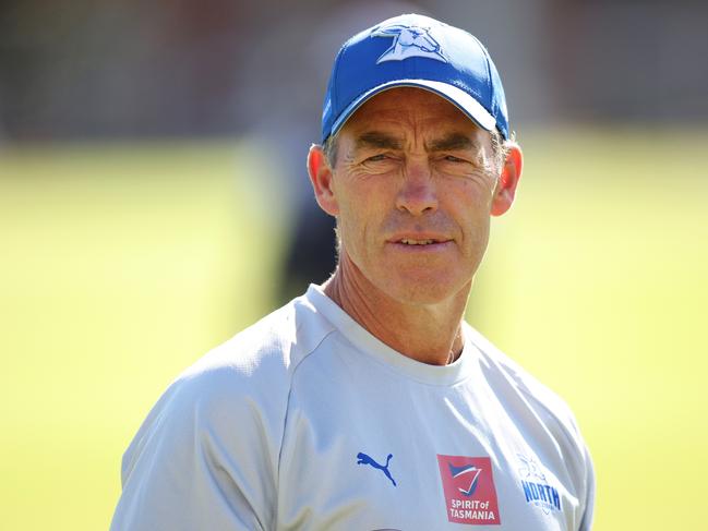 MELBOURNE, AUSTRALIA - MARCH 21: Alastair Clarkson, Senior Coach of the Kangaroos speaks to fans during a North Melbourne Kangaroos AFL training session at Arden Street Ground on March 21, 2024 in Melbourne, Australia. (Photo by Daniel Pockett/Getty Images)