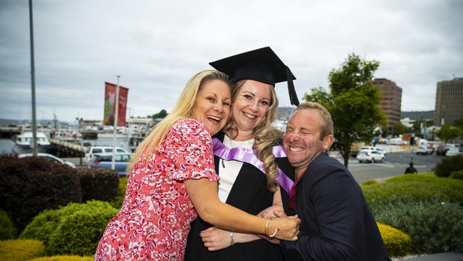 Sophie Gates (Centre) with Tracey Fowler and Will Keyes. University of Tasmania Graduations. Federation Concert Hall, Hobart. Picture: RICHARD JUPE