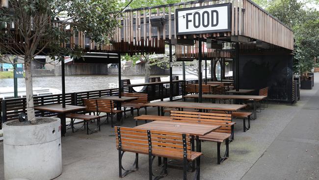 Empty bar tables in Melbourne CBD during COVID-19 lockdown last year. Picture: NCA NewsWire/ David Crosling