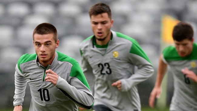 Local player (L) Liam Rose training with the Young Socceroos team.