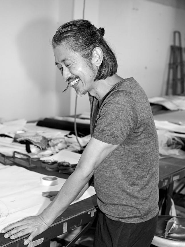 Isogawa at the cutting table. Picture: James Tolich for Vogue Australia