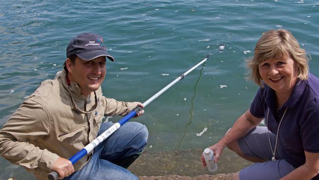 Chair, Mackay-Whitsunday Healthy Rivers to Reef Partnership Julie Boyd and Reef Catchments waterway officer Carlos Bueno at a monitoring site on the Pioneer River.