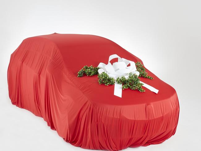 Photo of car wrapped up for Christmas sales story