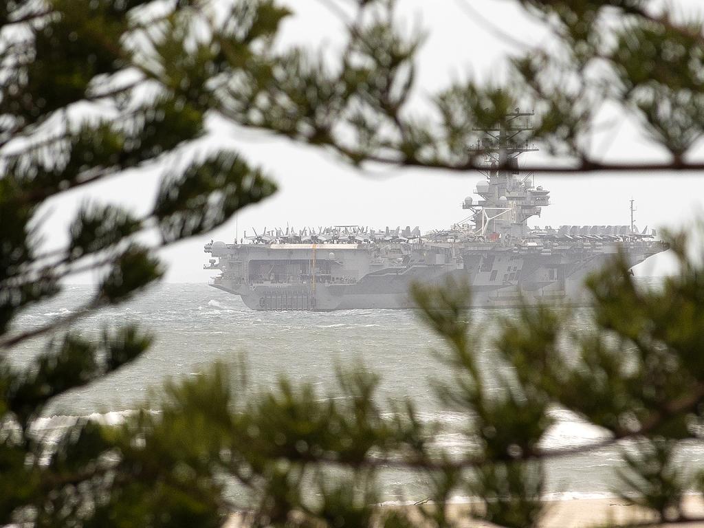 Local photographer Cade Mooney captured another war ship crossing the Coast today, believed to be the USS Ronald Reagan.