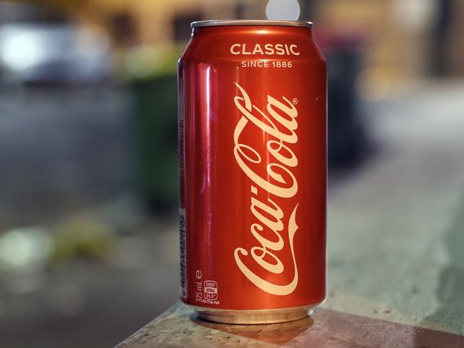 Pictured a can of Coca Cola at Kings Cross in Sydney.Picture: Richard Dobson