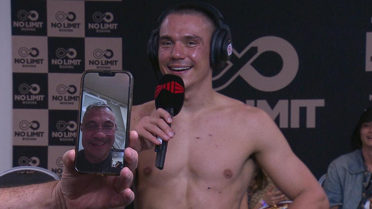Kostya Tszyu on the phone after Tim's world title defence against Brian Mendoza.