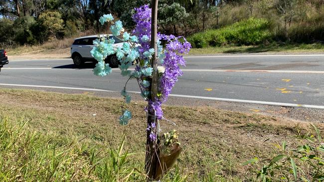 Flowers at the scene of the triple-fatal crash. Picture: Greg Stolz