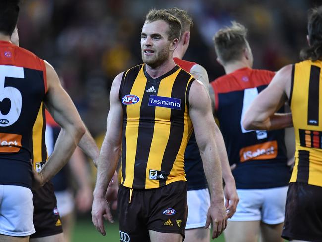 Tom Mitchell of the Hawks (centre) reacts after  the First Semi Final between the Hawthorn Hawks and the Melbourne Demons in Week 2 of the AFL Finals Series at the MCG in Melbourne, Friday, September 14, 2018. (AAP Image/Julian Smith) NO ARCHIVING, EDITORIAL USE ONLY